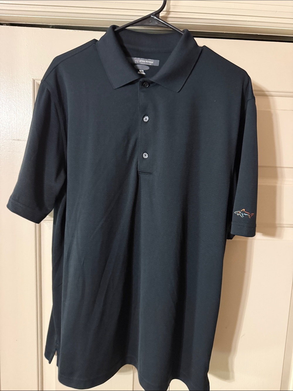 Greg Norman Collection Black Short-Sleeve Polo with Subtle Sleeve Logo